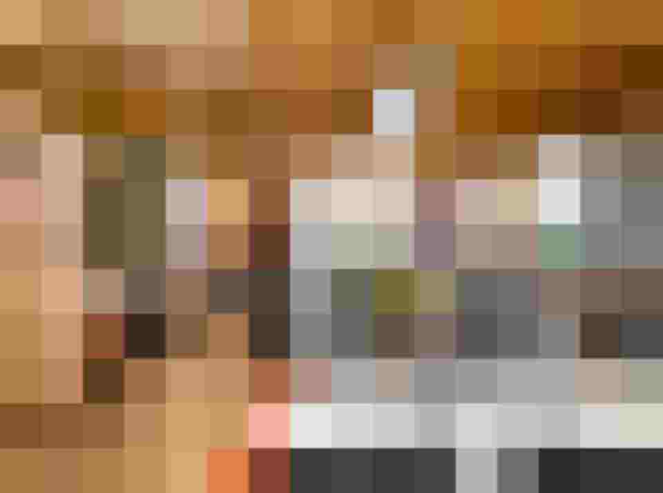 Gemütlicher Speisesaal im Hotel Grissemann mit Tischen und Pflanzen im Alpenstil.